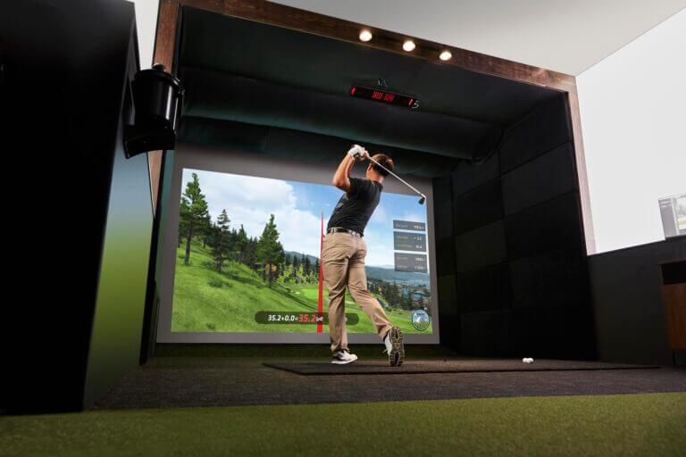 Golfer Hitting on Uneekor Eye XR Launch Monitor