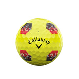 Yellow golf ball with Callaway logo on a white background