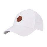 White cap with a brown leather patch on a white background