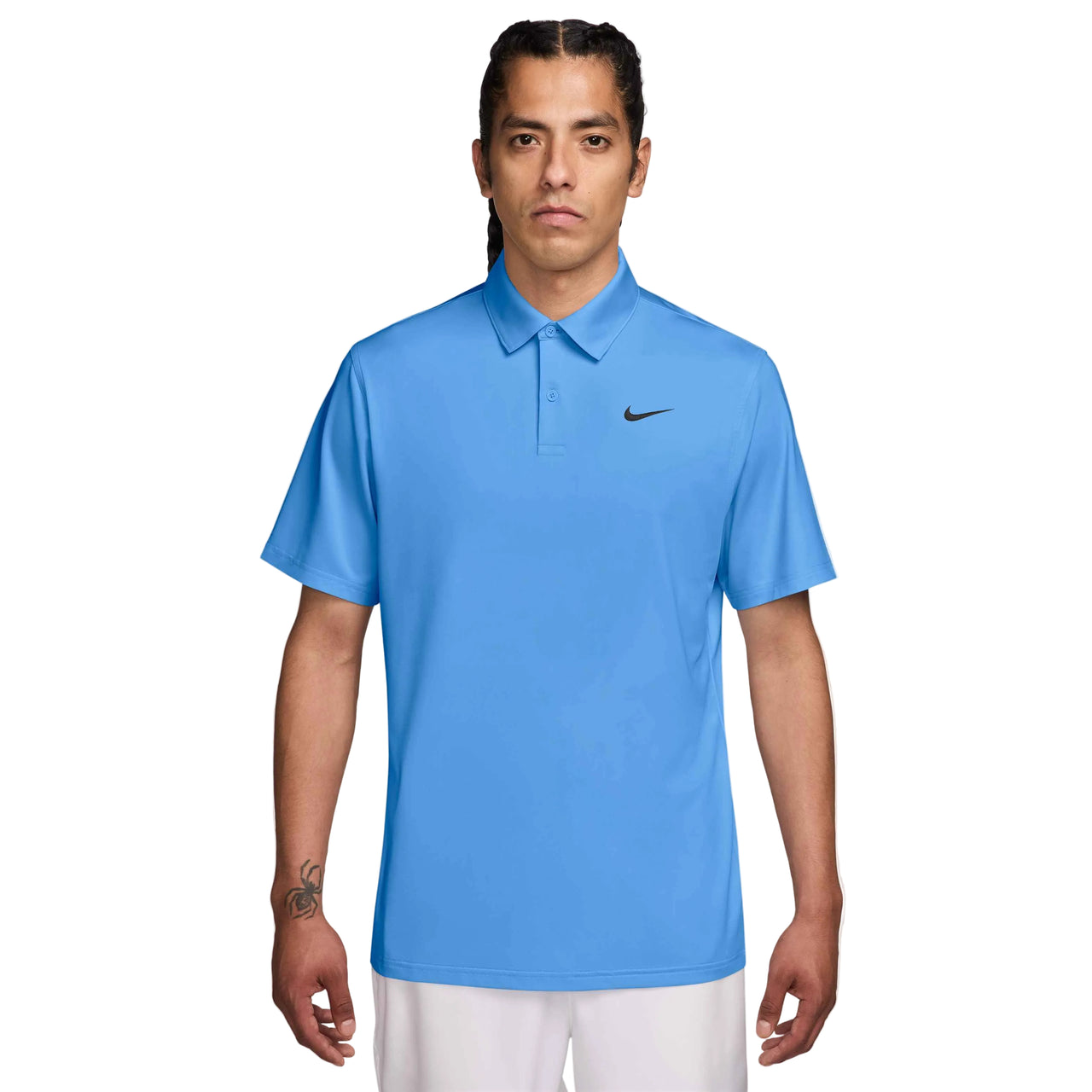 Man wearing a blue Nike polo shirt on a white background