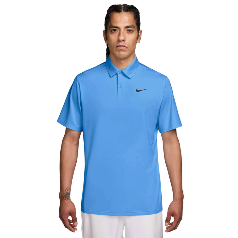 Man wearing a blue Nike polo shirt on a white background