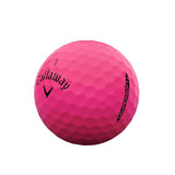 Pink golf ball with Callaway logo on a white background