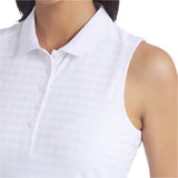 Close-up of a person wearing a white sleeveless shirt with a subtle pattern.