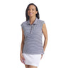 Woman wearing a striped sleeveless polo shirt and white skirt on a light gray background
