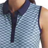Sleeveless top with blue geometric pattern and navy collar