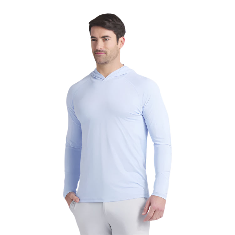 Man wearing a light blue long-sleeve shirt on a white background